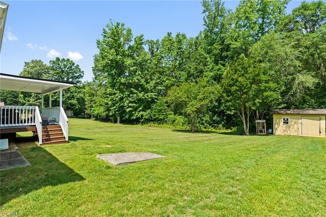 5215 Hicone Rd, Mcleansville, NC 27301 - view of grassy yard with a deck and stairway