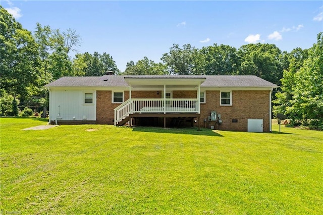 5215 Hicone Rd, Mcleansville, NC 27301 - back of house with a lawn, stairs, a deck, and brick siding