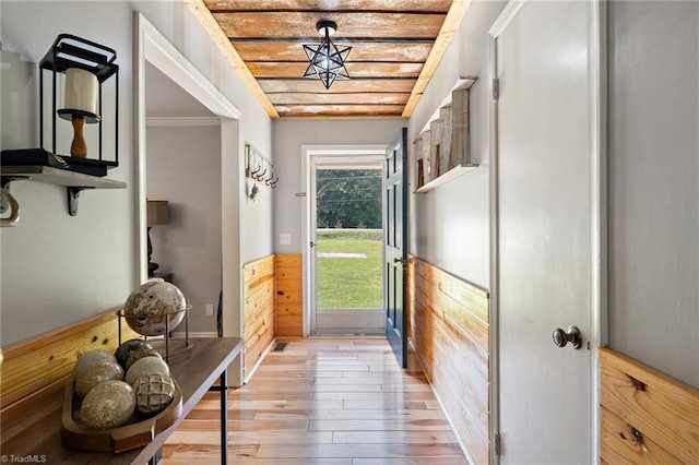 5215 Hicone Rd, Mcleansville, NC 27301 - entryway with light wood-type flooring, wainscoting, and wooden walls