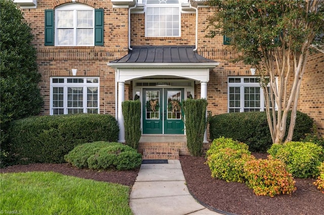 doorway to property featuring french doors