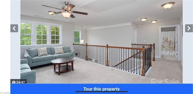 7464 Albemarle Ct, Denver, NC 28037 - carpeted living area with healthy amount of natural light and ceiling fan