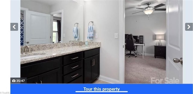 7464 Albemarle Ct, Denver, NC 28037 - bathroom with a ceiling fan and double vanity