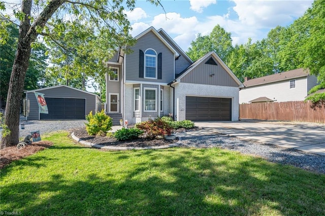 1705 Braemore Ct, Kernersville, NC 27284 - traditional-style home with brick siding, fence, a front yard, and concrete driveway