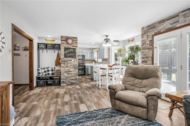1705 Braemore Ct, Kernersville, NC 27284 - living area featuring a ceiling fan and light wood-style flooring
