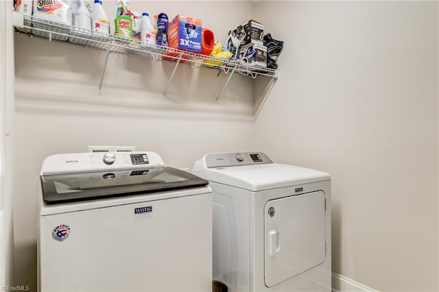 laundry area featuring separate washer and dryer