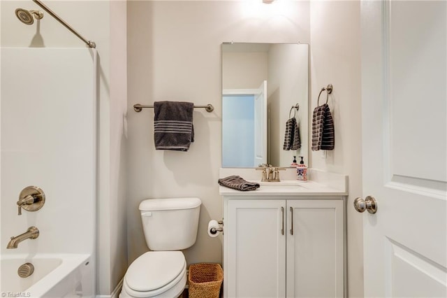 full bathroom featuring vanity, toilet, and  shower combination