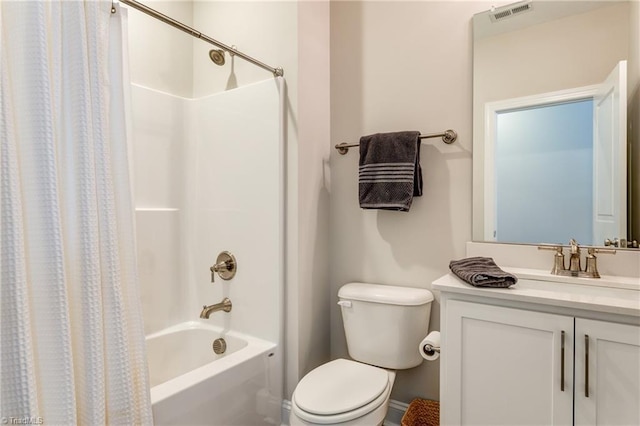 full bathroom with toilet, vanity, and shower / bath combo with shower curtain