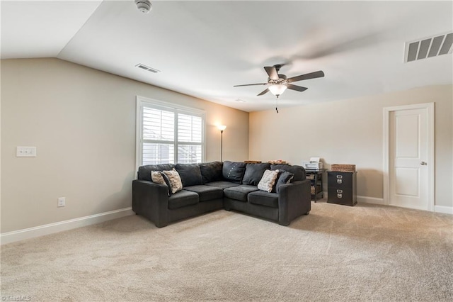 carpeted living room featuring lofted ceiling and ceiling fan