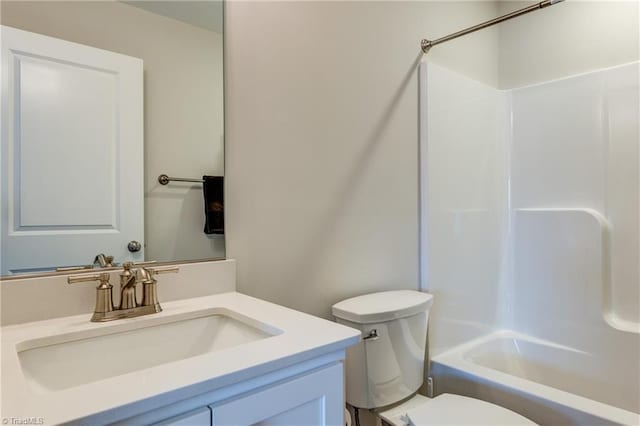 full bathroom with vanity, toilet, and shower / bathing tub combination