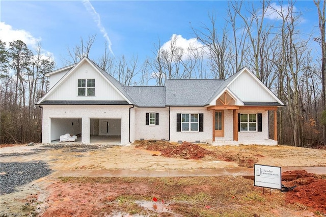 view of front of house with a garage