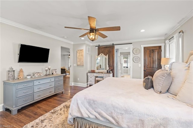 bedroom featuring ceiling fan, a barn door, dark hardwood / wood-style flooring, and crown molding