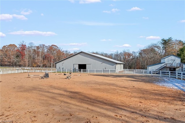 exterior space with a rural view