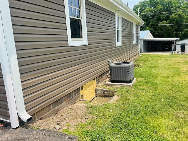 1406 E Pine St, Mount Airy, NC 27030 - view of side of home with cooling unit and a yard