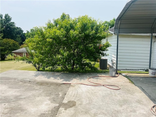 1406 E Pine St, Mount Airy, NC 27030 - view of side of home featuring central AC