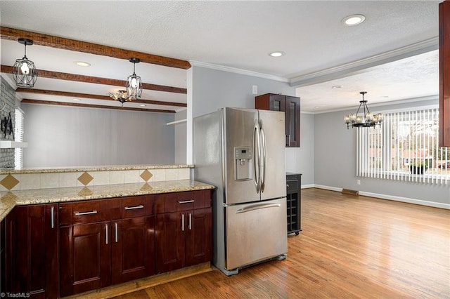 kitchen with a chandelier, stainless steel fridge with ice dispenser, light wood finished floors, tasteful backsplash, and beam ceiling