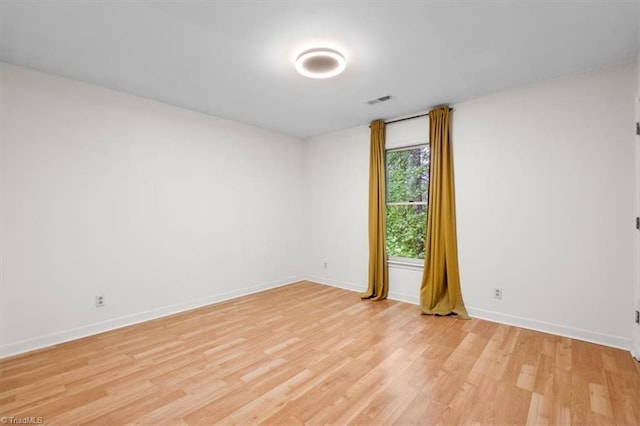 573 Doe Run Dr, Kernersville, NC 27284 - empty room with light wood-type flooring and baseboards