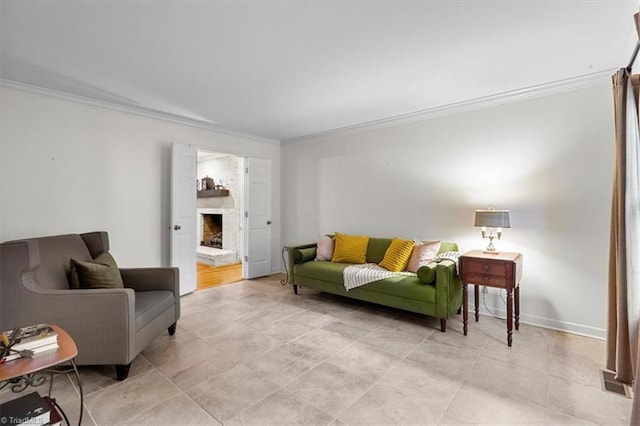 573 Doe Run Dr, Kernersville, NC 27284 - living room with crown molding, a fireplace with raised hearth, and baseboards