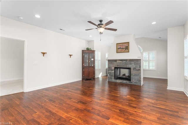 unfurnished living room with a fireplace, recessed lighting, ceiling fan, wood finished floors, and baseboards