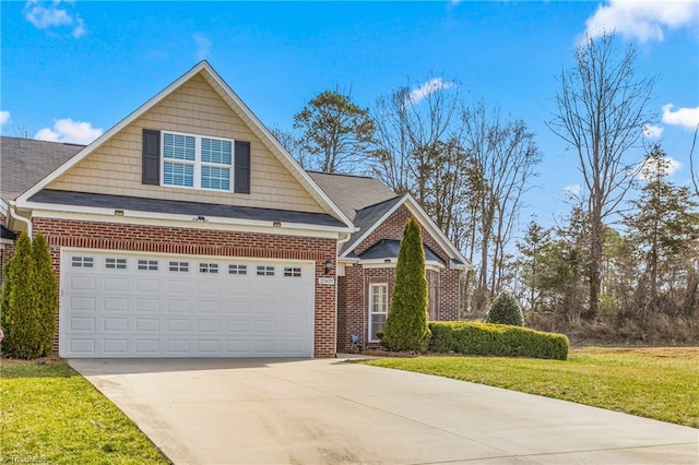 view of front of property with driveway, a garage, a front lawn, and brick siding