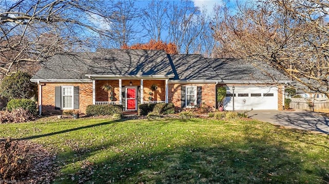 single story home featuring a front lawn and a garage