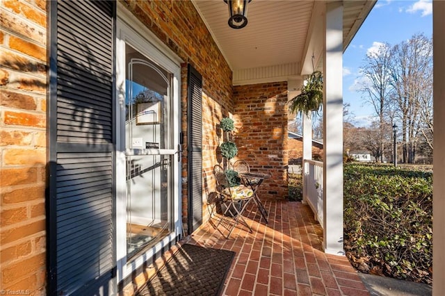 view of patio featuring a porch