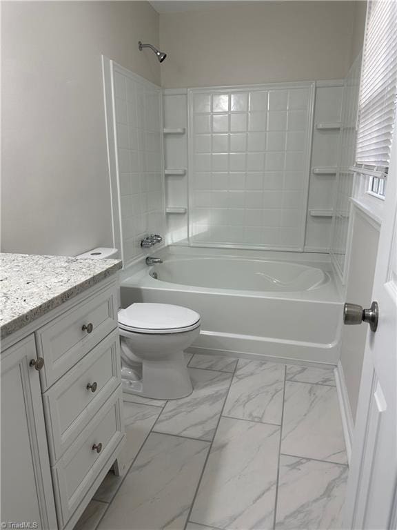 full bathroom with toilet, vanity, and shower / bathing tub combination