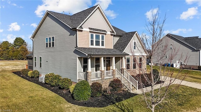 exterior space with a porch and a front lawn