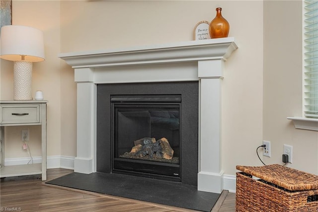 1837 Deveron Ct, Kernersville, NC 27284 - detailed view of a fireplace with raised hearth and wood finished floors