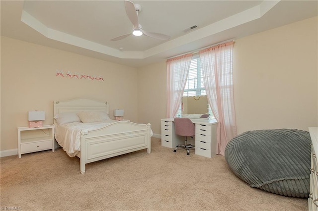 1837 Deveron Ct, Kernersville, NC 27284 - bedroom with a raised ceiling, light colored carpet, and a ceiling fan