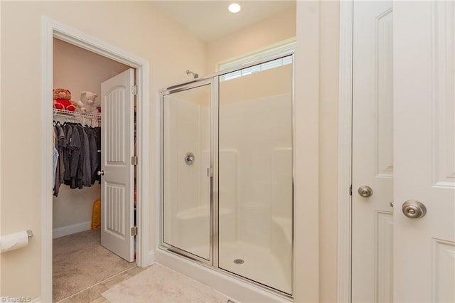 1837 Deveron Ct, Kernersville, NC 27284 - bathroom featuring a stall shower and a spacious closet