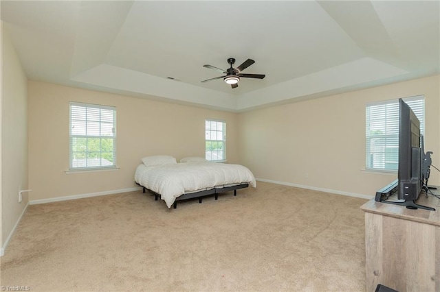 1837 Deveron Ct, Kernersville, NC 27284 - carpeted bedroom featuring a tray ceiling and ceiling fan