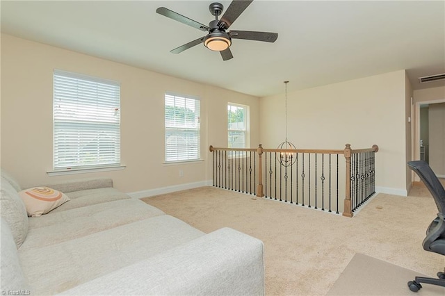 1837 Deveron Ct, Kernersville, NC 27284 - carpeted living area featuring a ceiling fan and baseboards