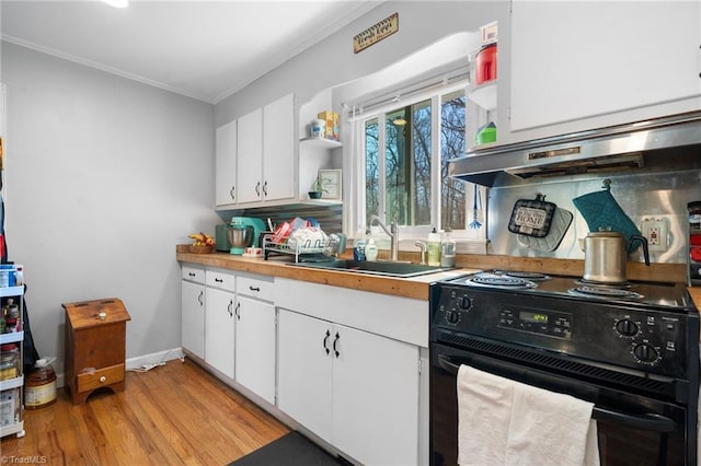 kitchen with white cabinetry, extractor fan, electric range, and light hardwood / wood-style floors