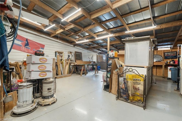 basement with a workshop area