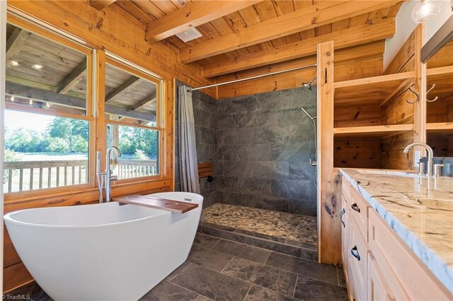 full bath featuring wooden ceiling, a tile shower, vanity, a soaking tub, and beam ceiling