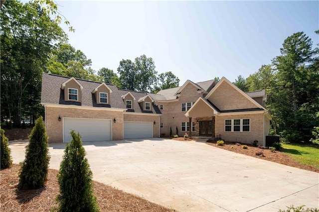 128 Provence Ct, King, NC 27021 - view of front of home with brick siding, concrete driveway, and a garage