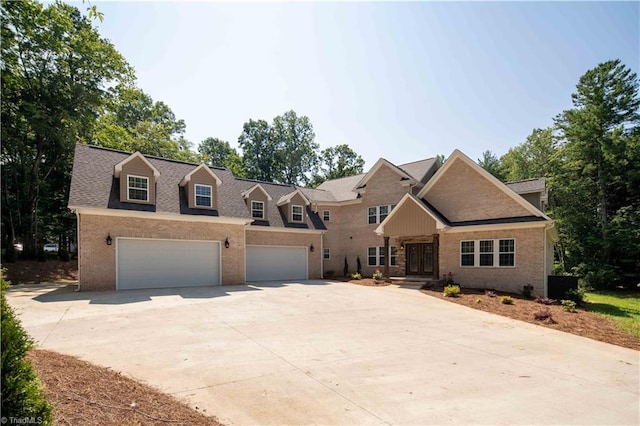 128 Provence Ct, King, NC 27021 - view of front of home with brick siding, driveway, an attached garage, and a shingled roof