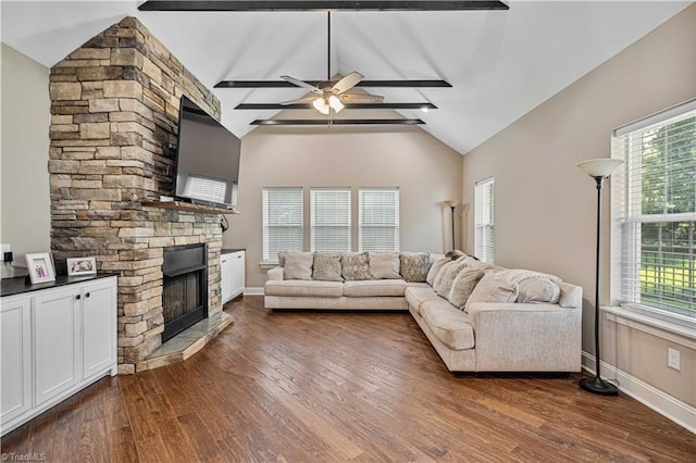 128 Provence Ct, King, NC 27021 - living room with a stone fireplace, dark wood-type flooring, ceiling fan, beam ceiling, and high vaulted ceiling