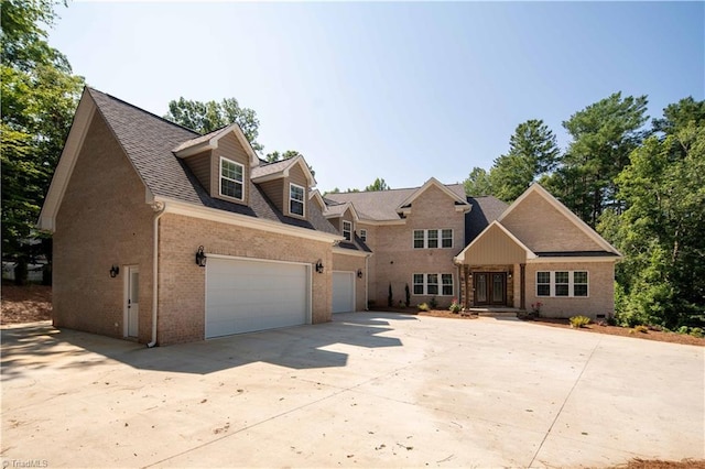 128 Provence Ct, King, NC 27021 - view of front of property featuring concrete driveway, brick siding, and roof with shingles