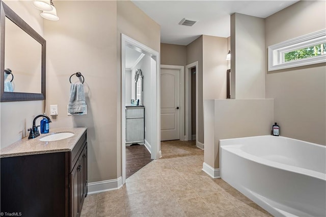 128 Provence Ct, King, NC 27021 - bathroom with vanity, a bath, and tile patterned floors