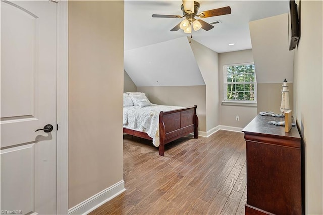 128 Provence Ct, King, NC 27021 - bedroom with wood finished floors, a ceiling fan, and vaulted ceiling
