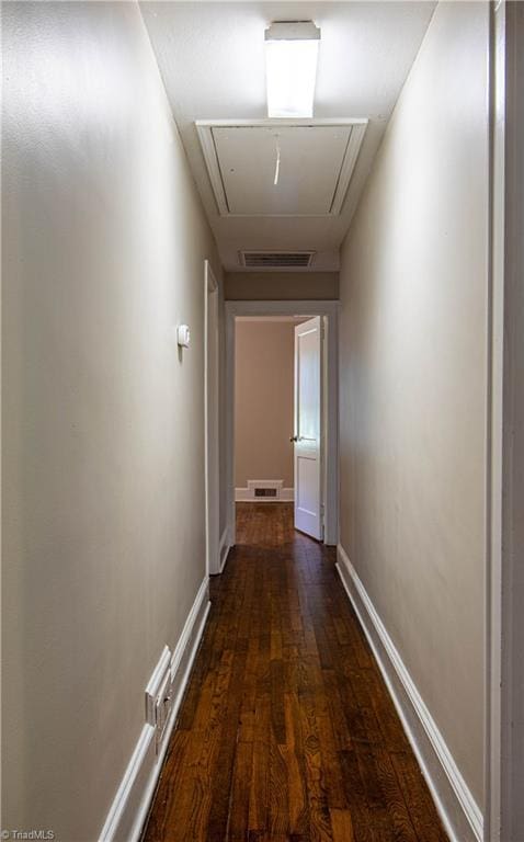2370 W Clemmonsville Rd, Winston-Salem, NC 27127 - hall with attic access, wood finished floors, and baseboards