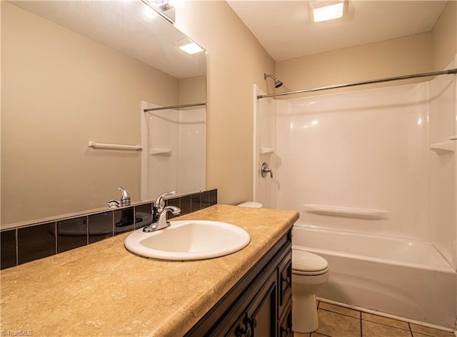2370 W Clemmonsville Rd, Winston-Salem, NC 27127 - full bathroom featuring toilet, tile patterned flooring, vanity, and washtub / shower combination