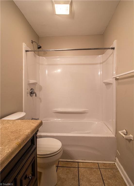 2370 W Clemmonsville Rd, Winston-Salem, NC 27127 - bathroom with toilet, tile patterned floors, vanity, and shower / washtub combination