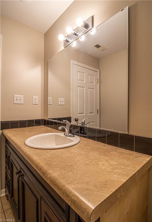 2370 W Clemmonsville Rd, Winston-Salem, NC 27127 - bathroom with vanity and tile patterned floors