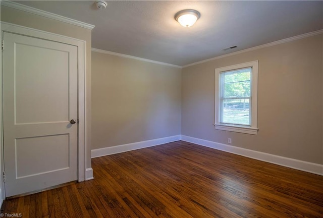 2370 W Clemmonsville Rd, Winston-Salem, NC 27127 - unfurnished room with baseboards, dark wood finished floors, ornamental molding, and a smoke detector