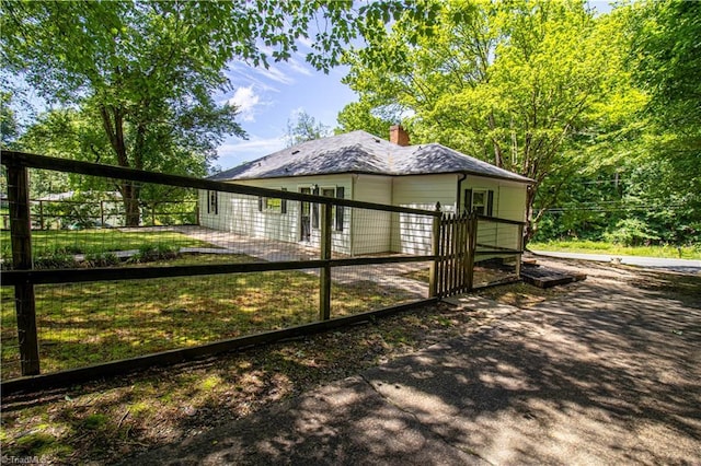 2370 W Clemmonsville Rd, Winston-Salem, NC 27127 - view of home's exterior with a chimney