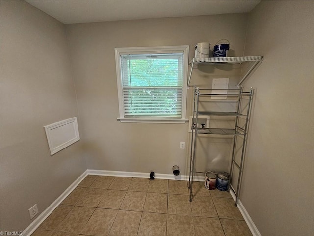 2370 W Clemmonsville Rd, Winston-Salem, NC 27127 - washroom featuring washer hookup, tile patterned floors, and baseboards