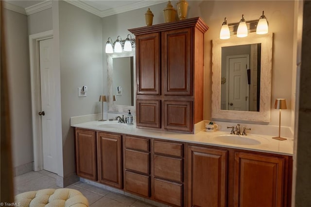 bathroom with tile patterned floors, double vanity, crown molding, and a sink