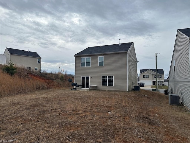 back of property featuring a patio and central AC unit